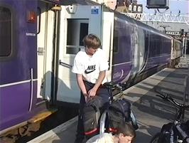 Gavin loads his panniers at Euston station, London